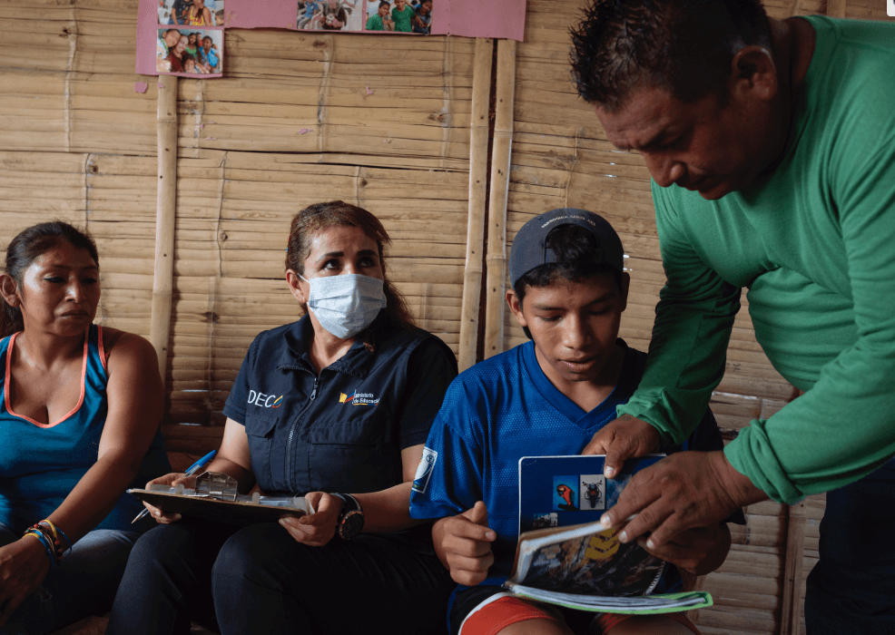 Jair with his teachers and family