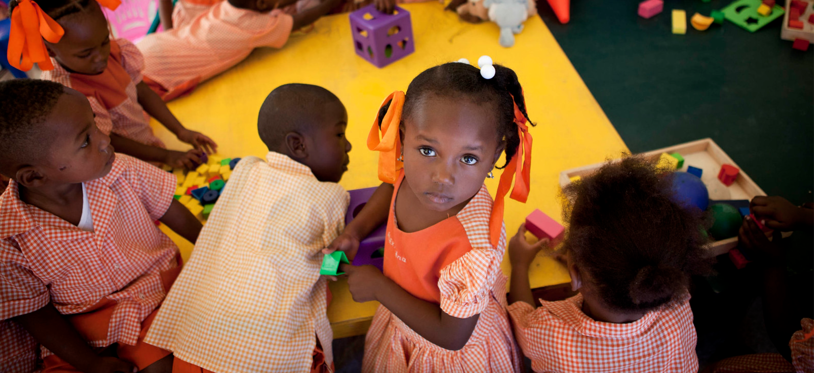 Young girl in Haiti draws. Young girl in Haiti draws.