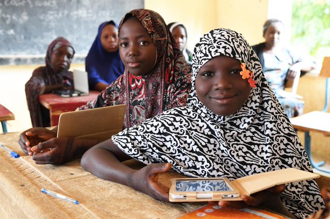 Girls attending class