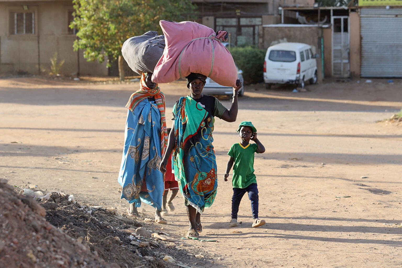 Family walking in Sudan