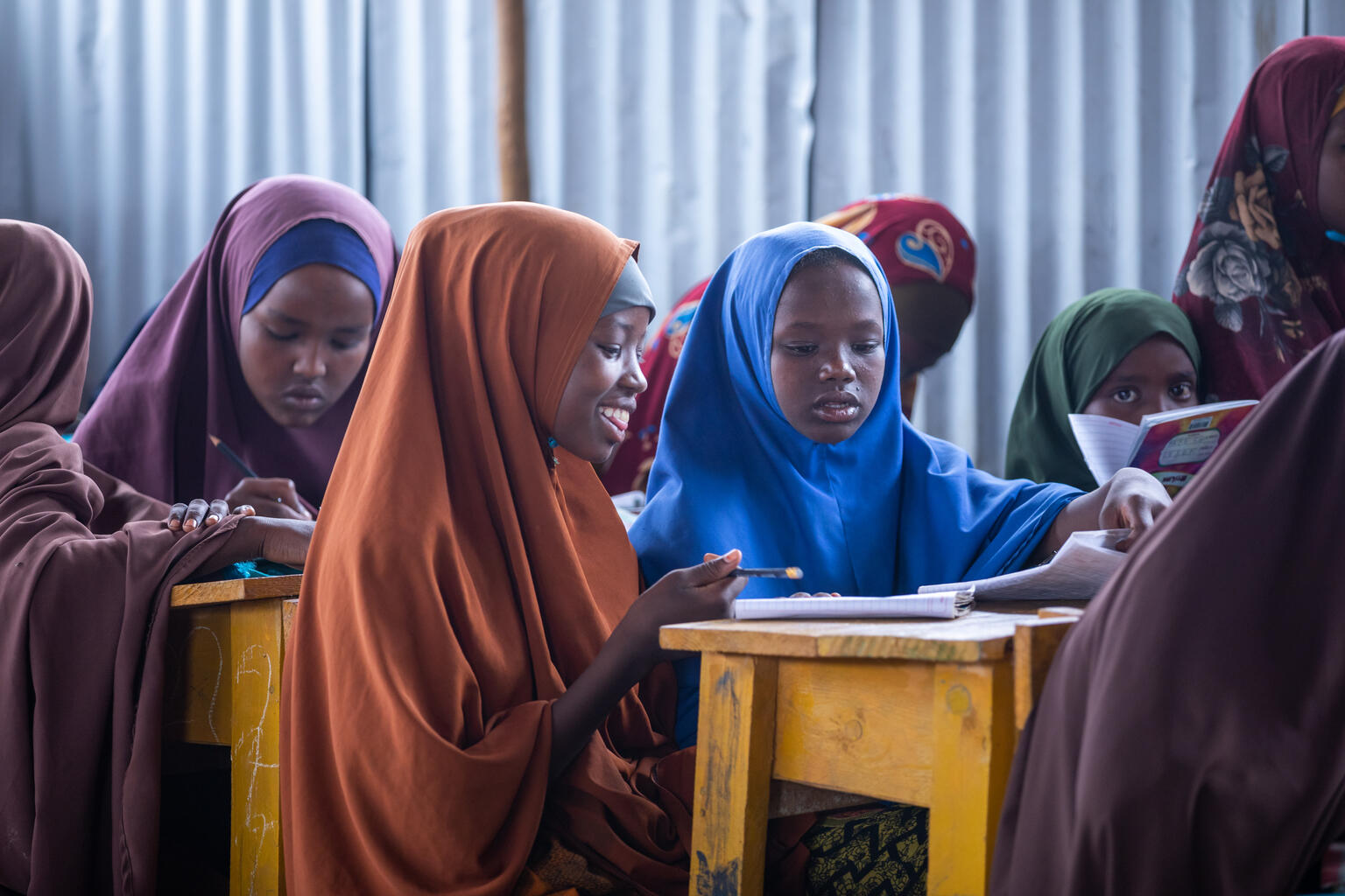 Girls in Somalia studying in class.