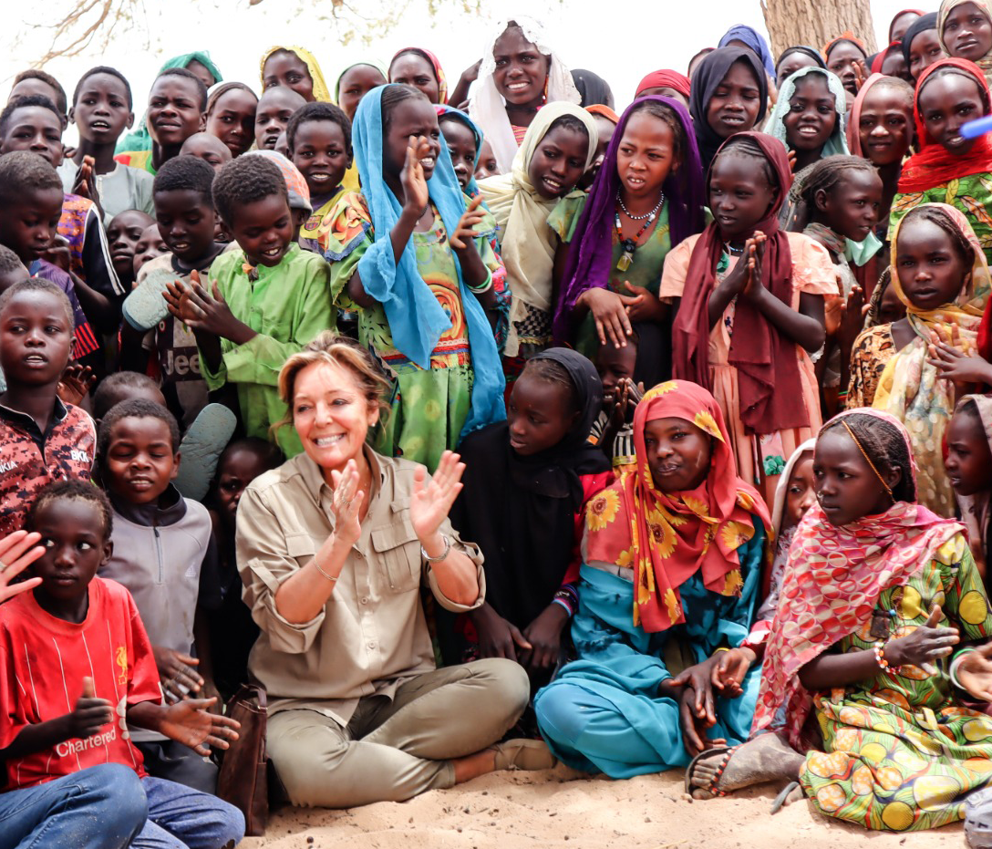 ECW Executive Director Yasmine Sherif with refugee children in Borota, Chad