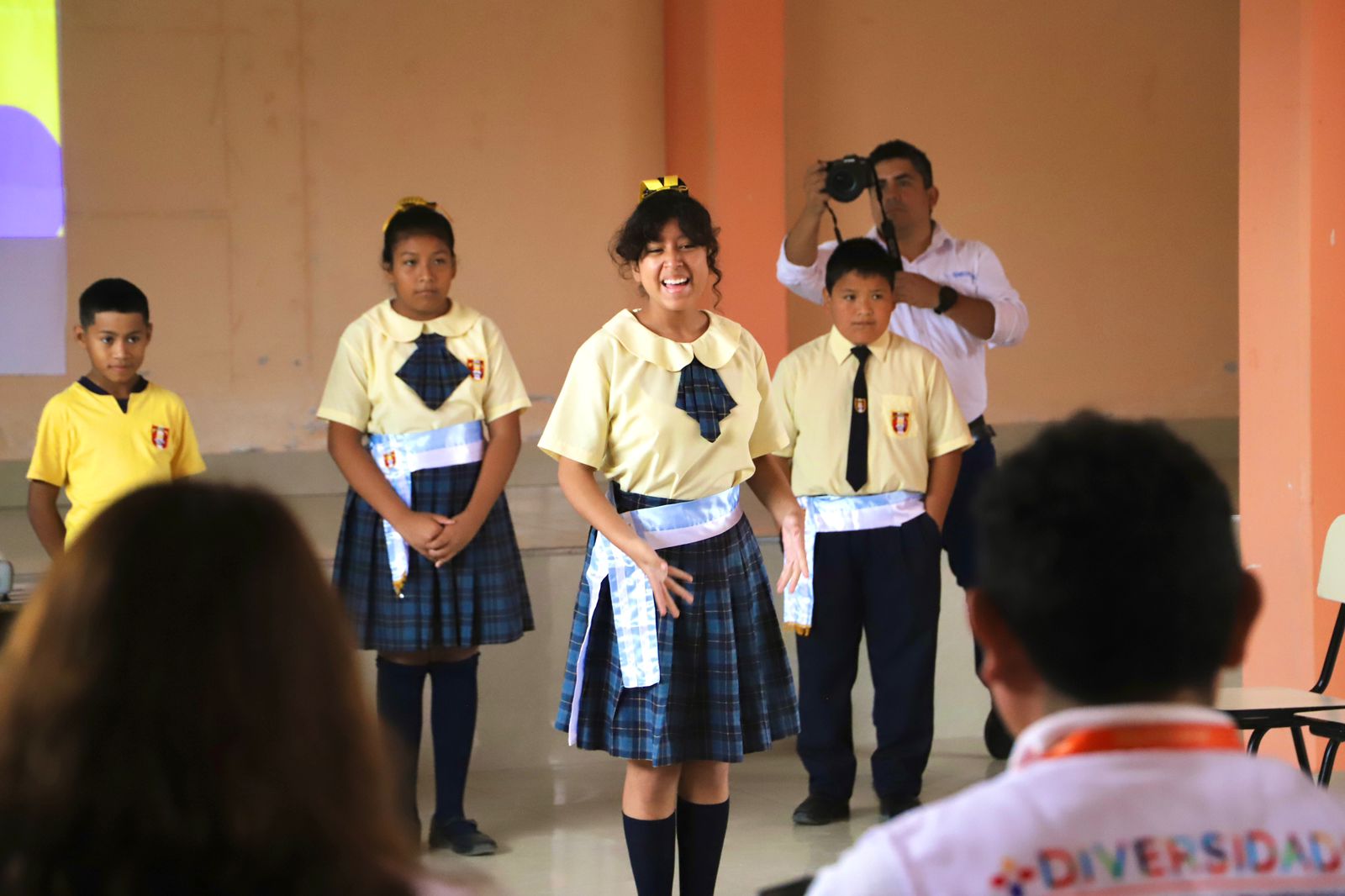 Girl in Peru speaking.