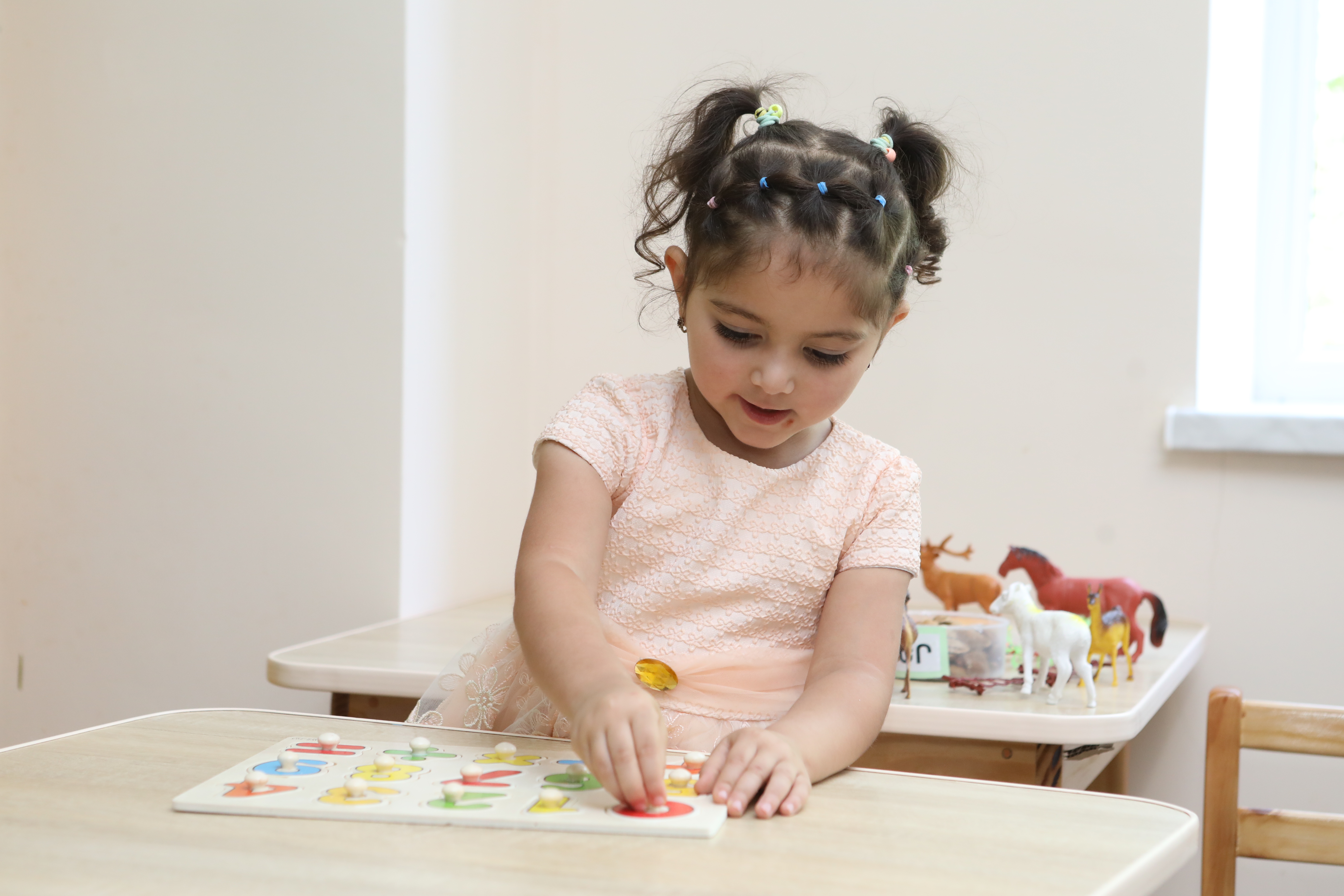 Young girl drawing in Armenia.