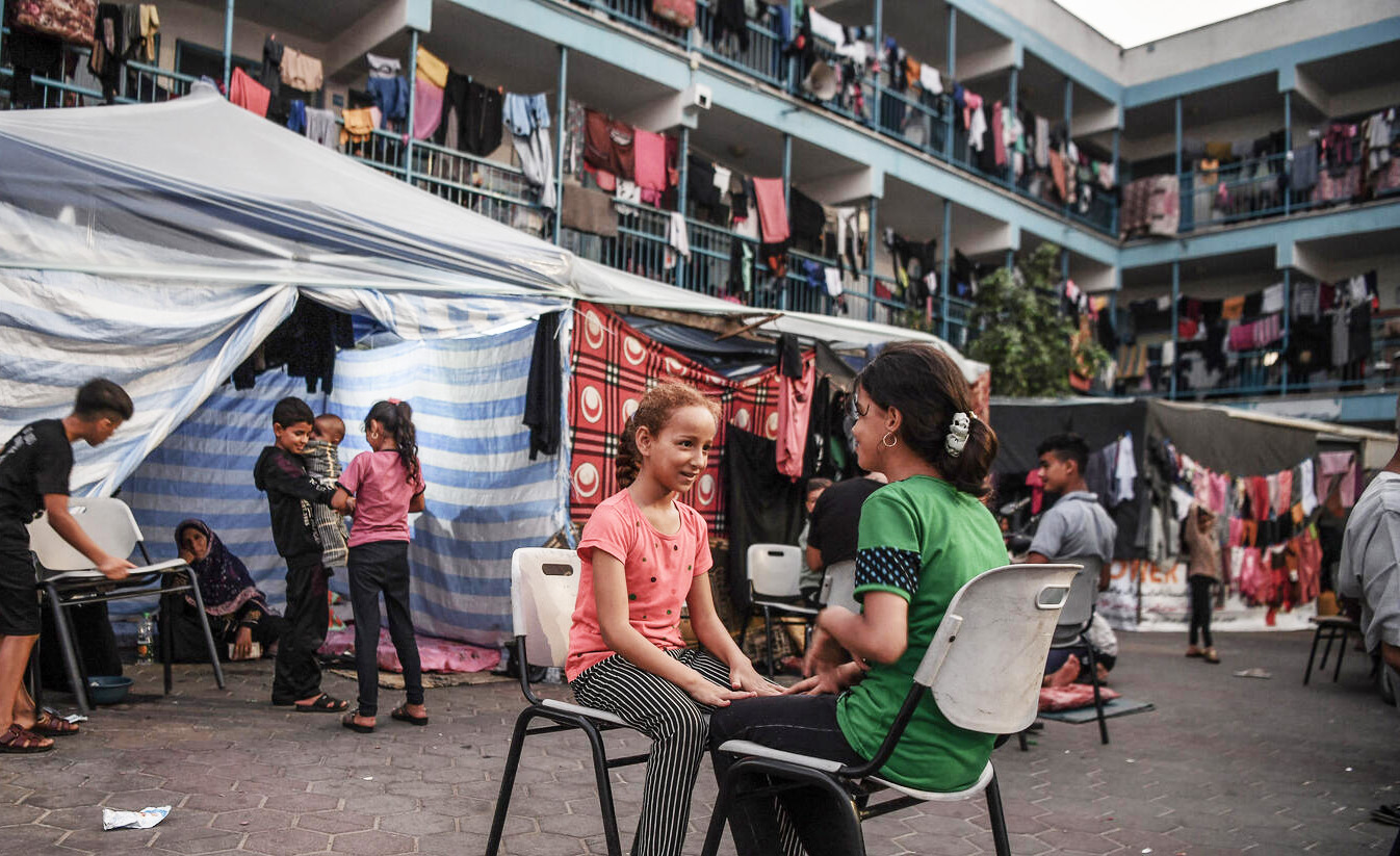 Children at a school used as a shelter in Gaza