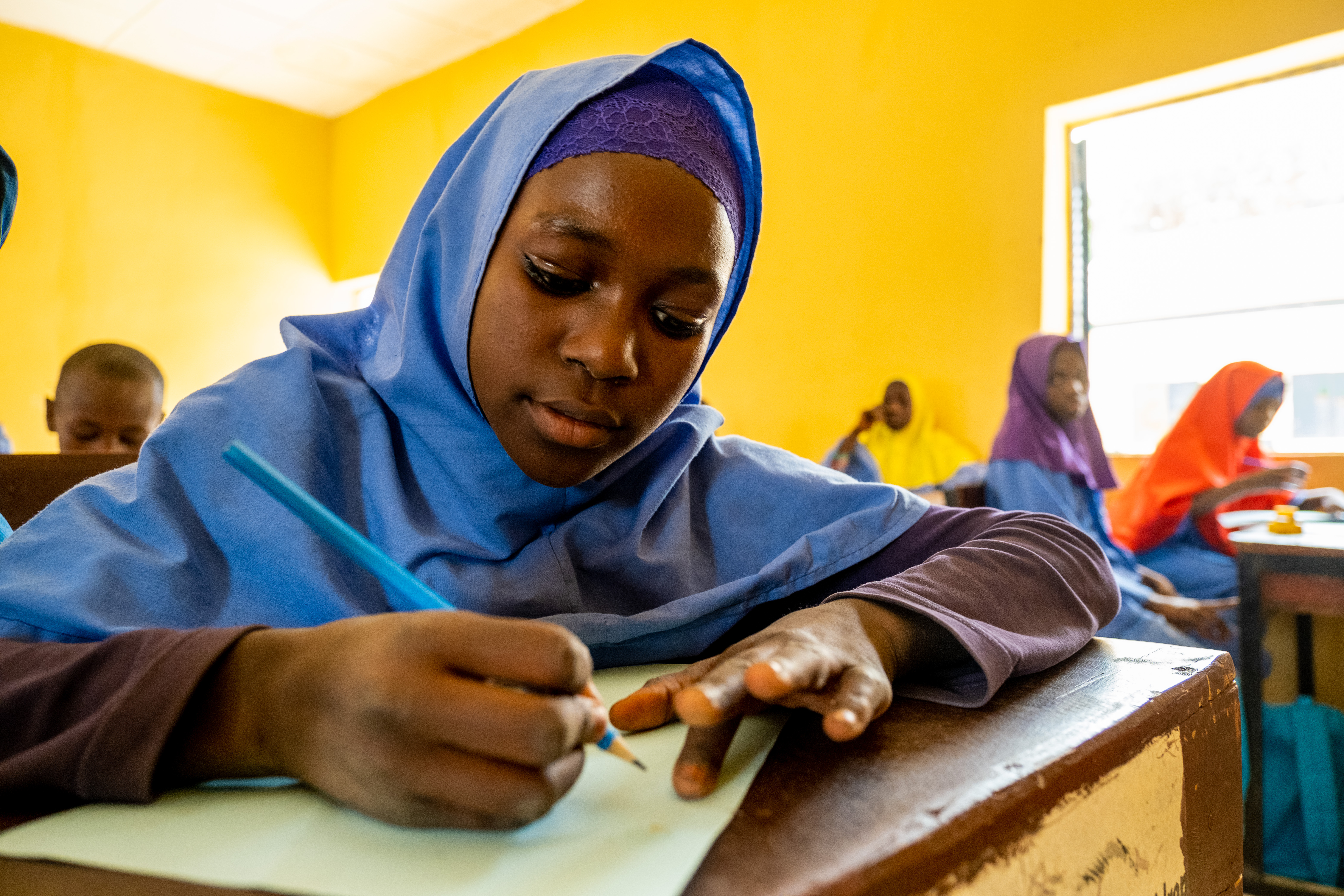 Girl in Nigeria attending class