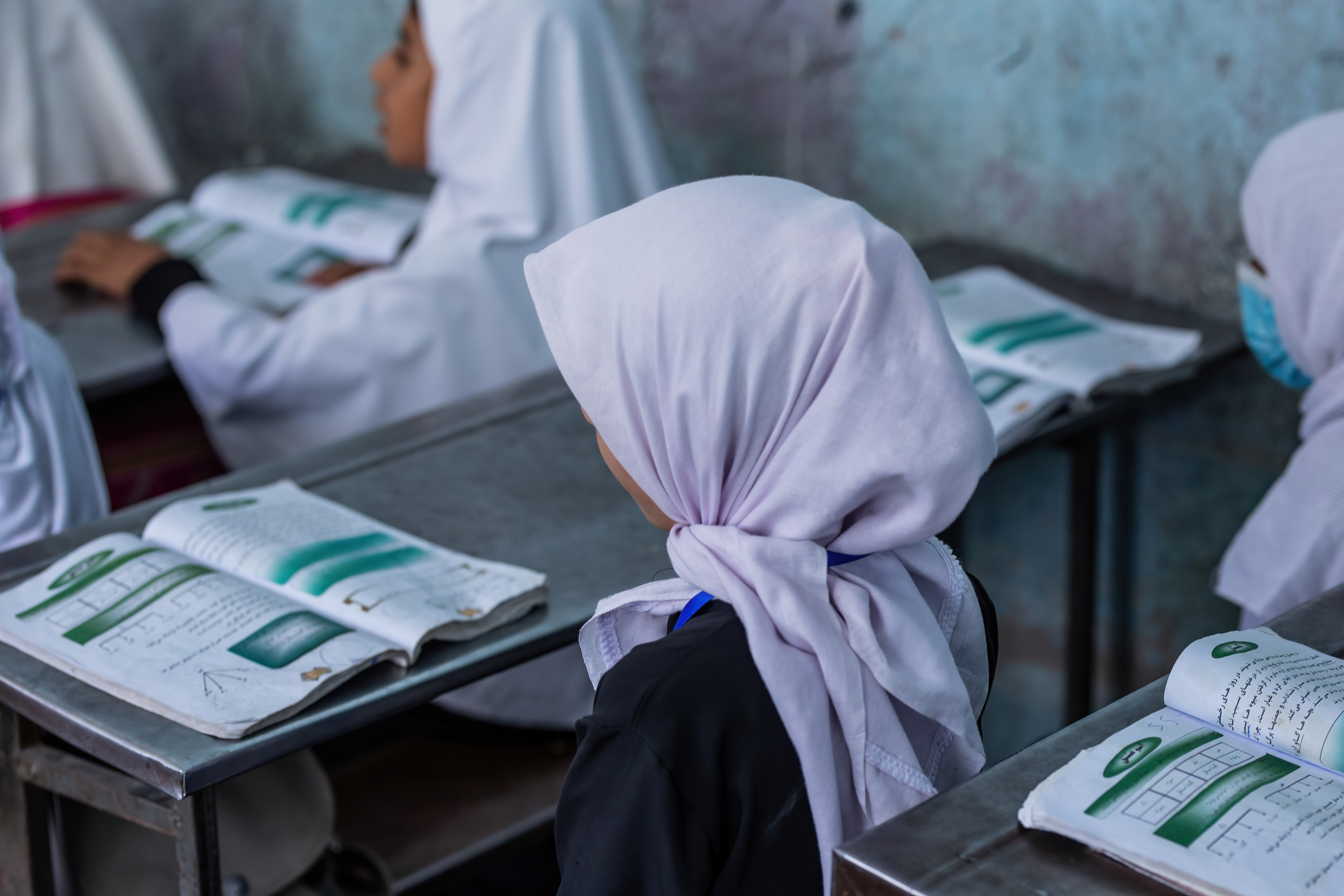 Afghan girl attending class