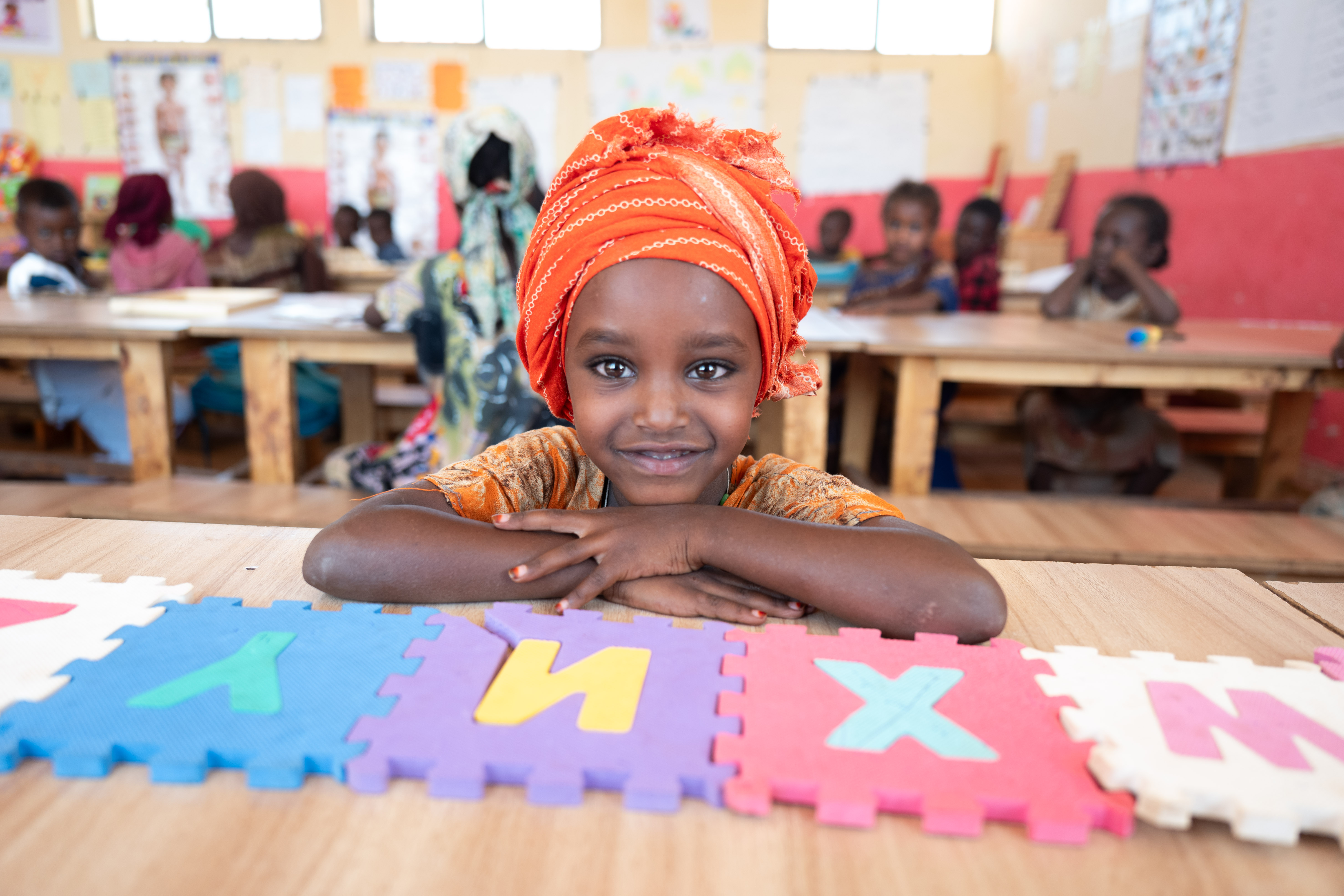 Girl in classroom in Ethiopia.