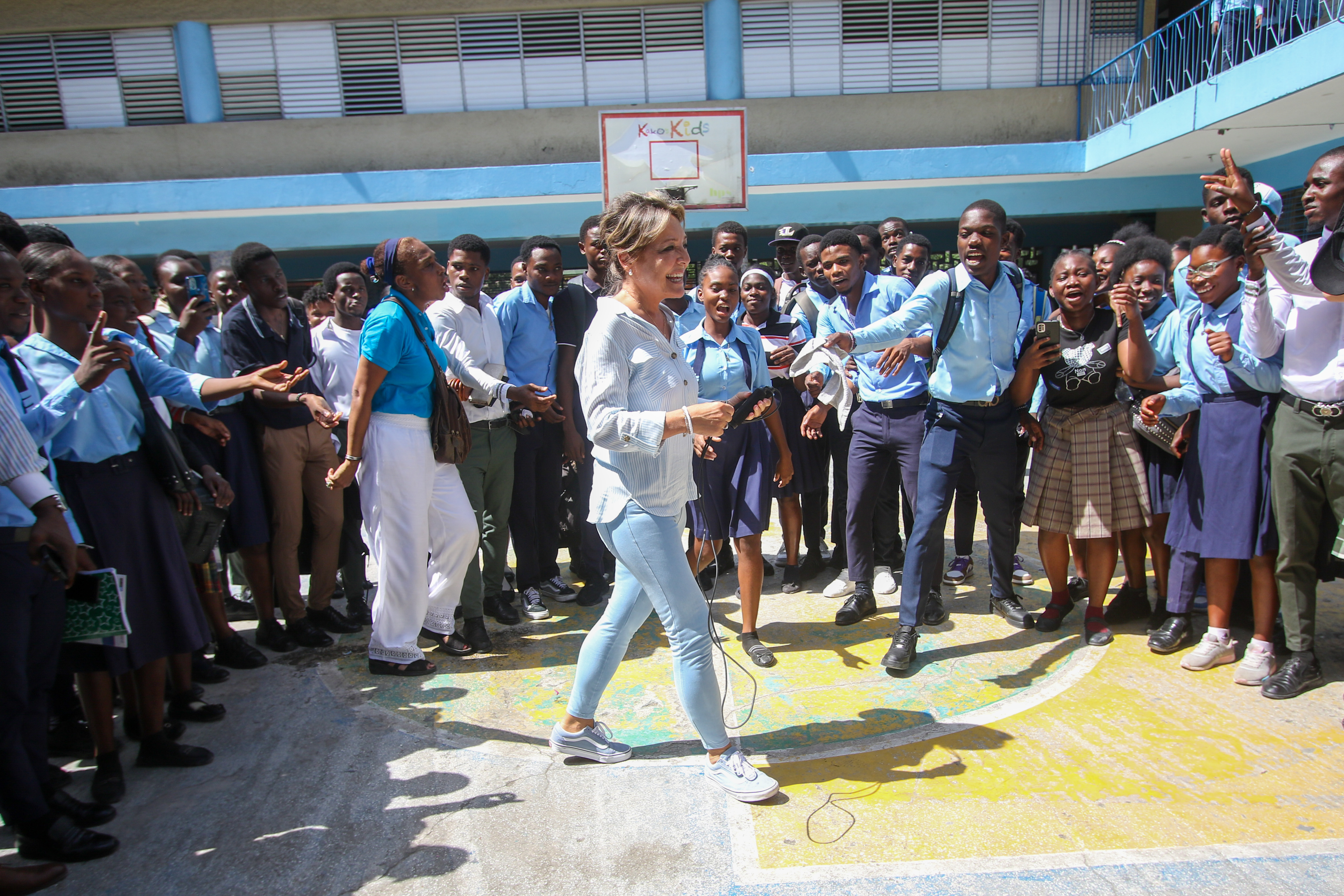 Yasmine Sherif with children at a school in Haiti