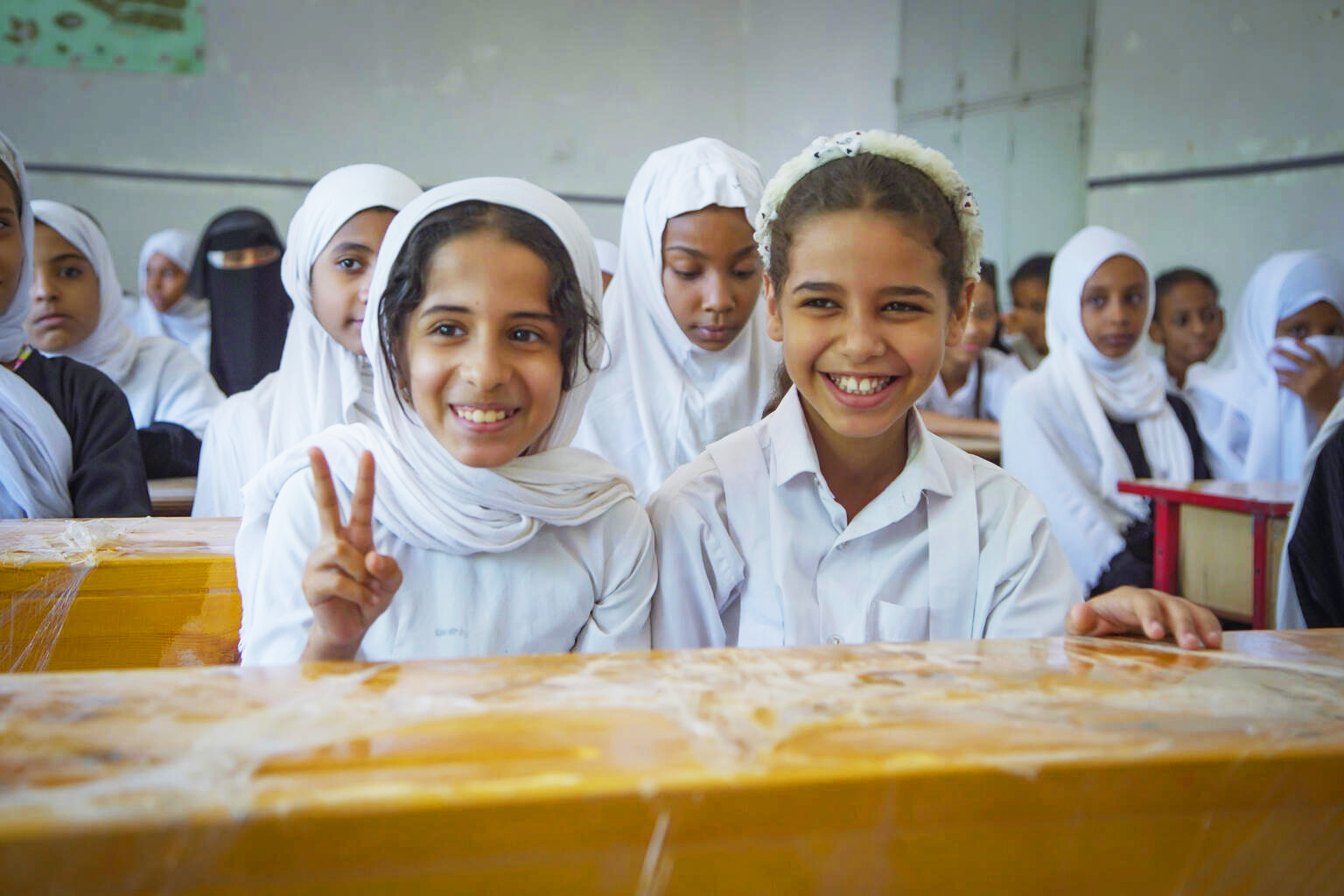 girls smiling during class