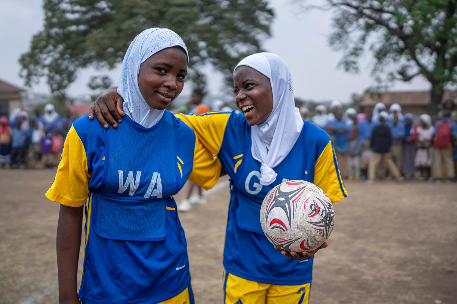 Girls playing football