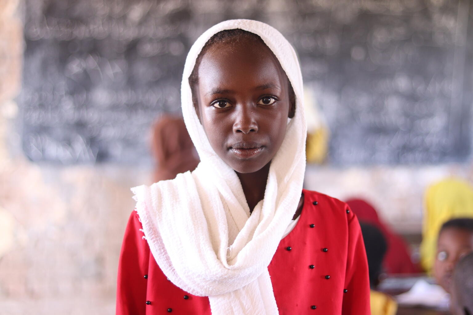 Sudanese girl attending class