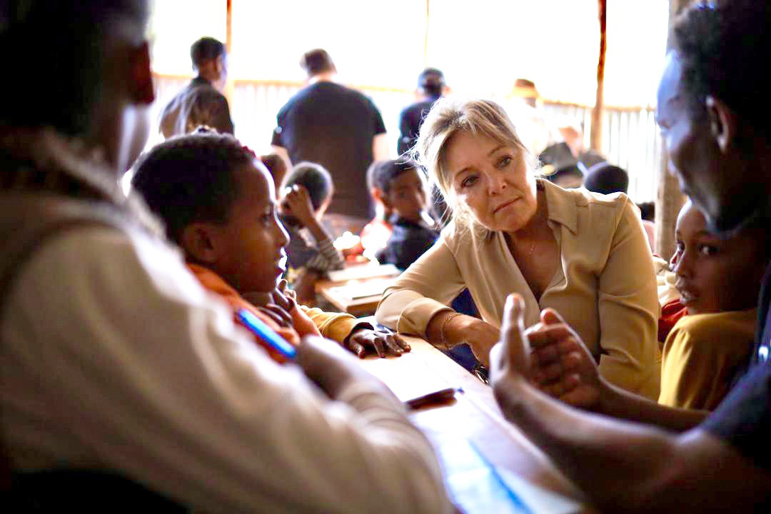 Yasmine Sherif with children at a school in Ethiopia