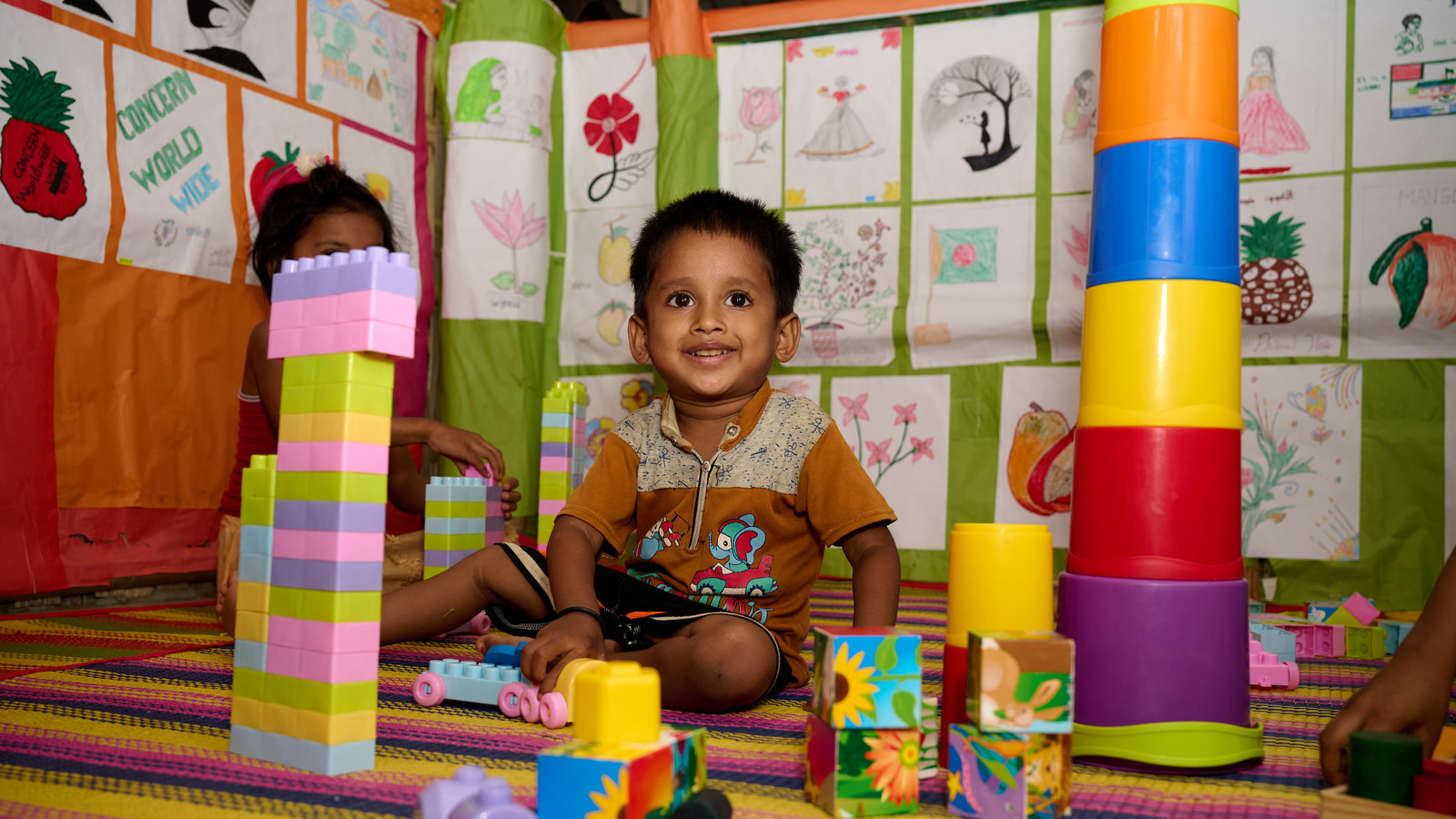 Child plays with LEGO in the Rohingya refugee camps